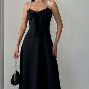Elegant Black Dress with Pearl Straps